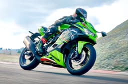 Kawasaki Ninja ZX4RR front right side riding image on track