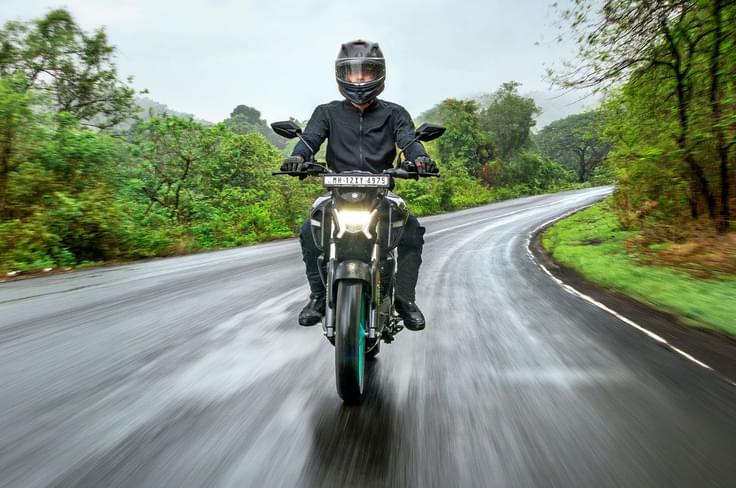 It gets a LED headlight. Yamaha FZ-S Fi Hybrid front riding image