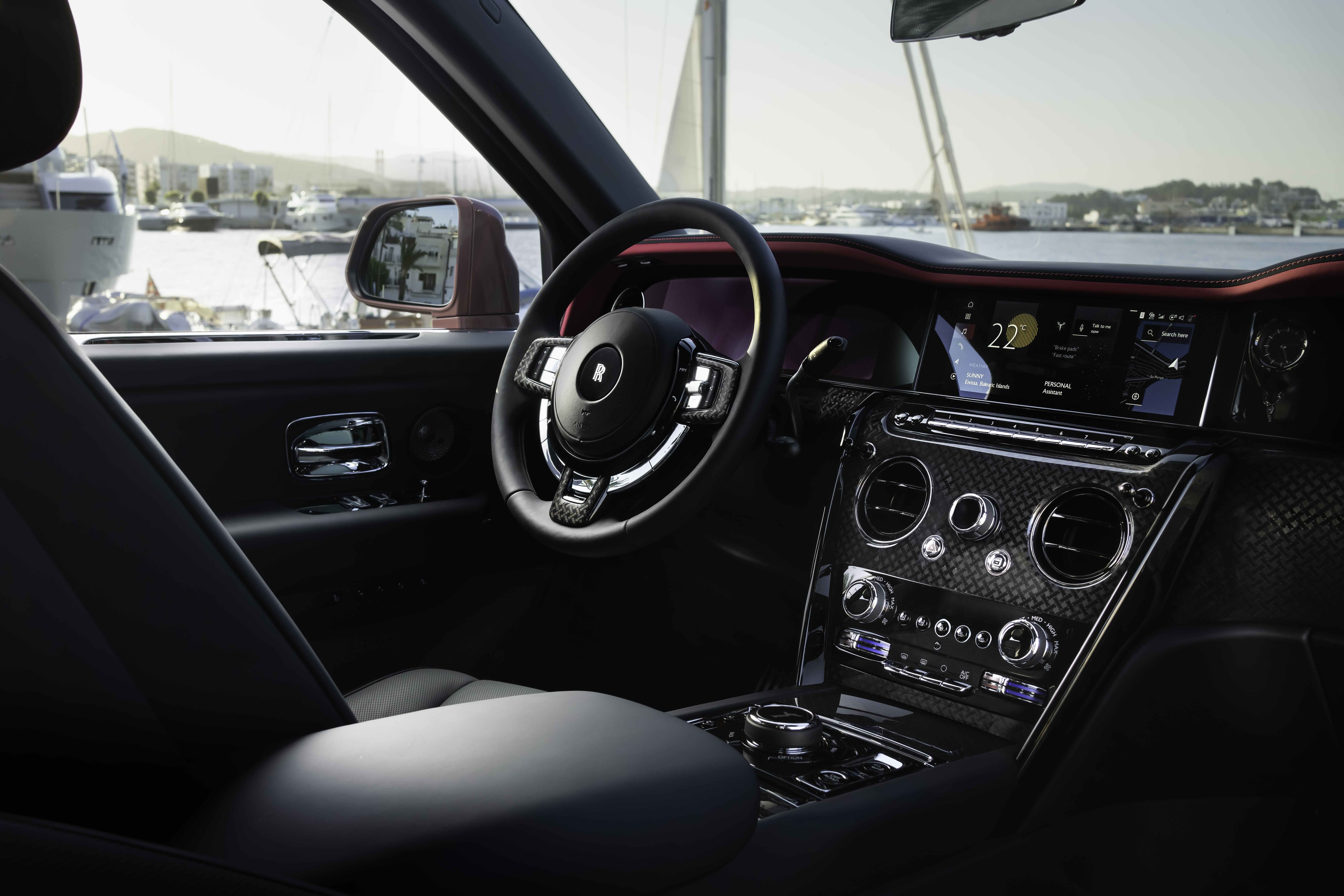 rolls royce cullinan black badge in field