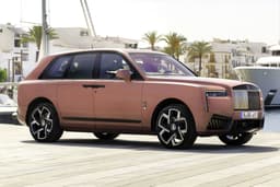 rolls royce cullinan black badge in field
