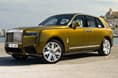 rolls royce cullinan series 2 front three quarter rolls royce cullinan series 2 in field