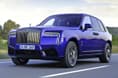 rolls royce cullinan black badge front three quarter tracking rolls royce cullinan black badge on road