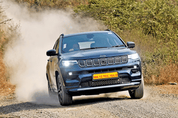Jeep Compass is climbing up the hill