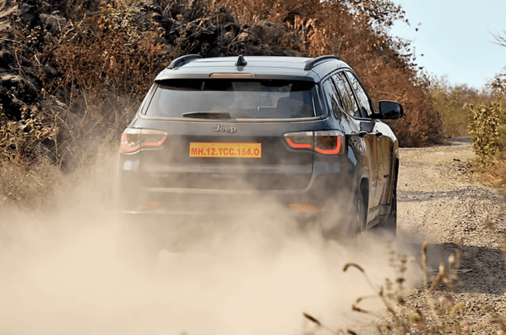 The springs are slightly firm, so you can feel some sharp bumps at low speeds. Jeep Compass creates a dust storm