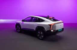 Mahindra XEV 9e Pack Two exterior white rear three quarter in studio