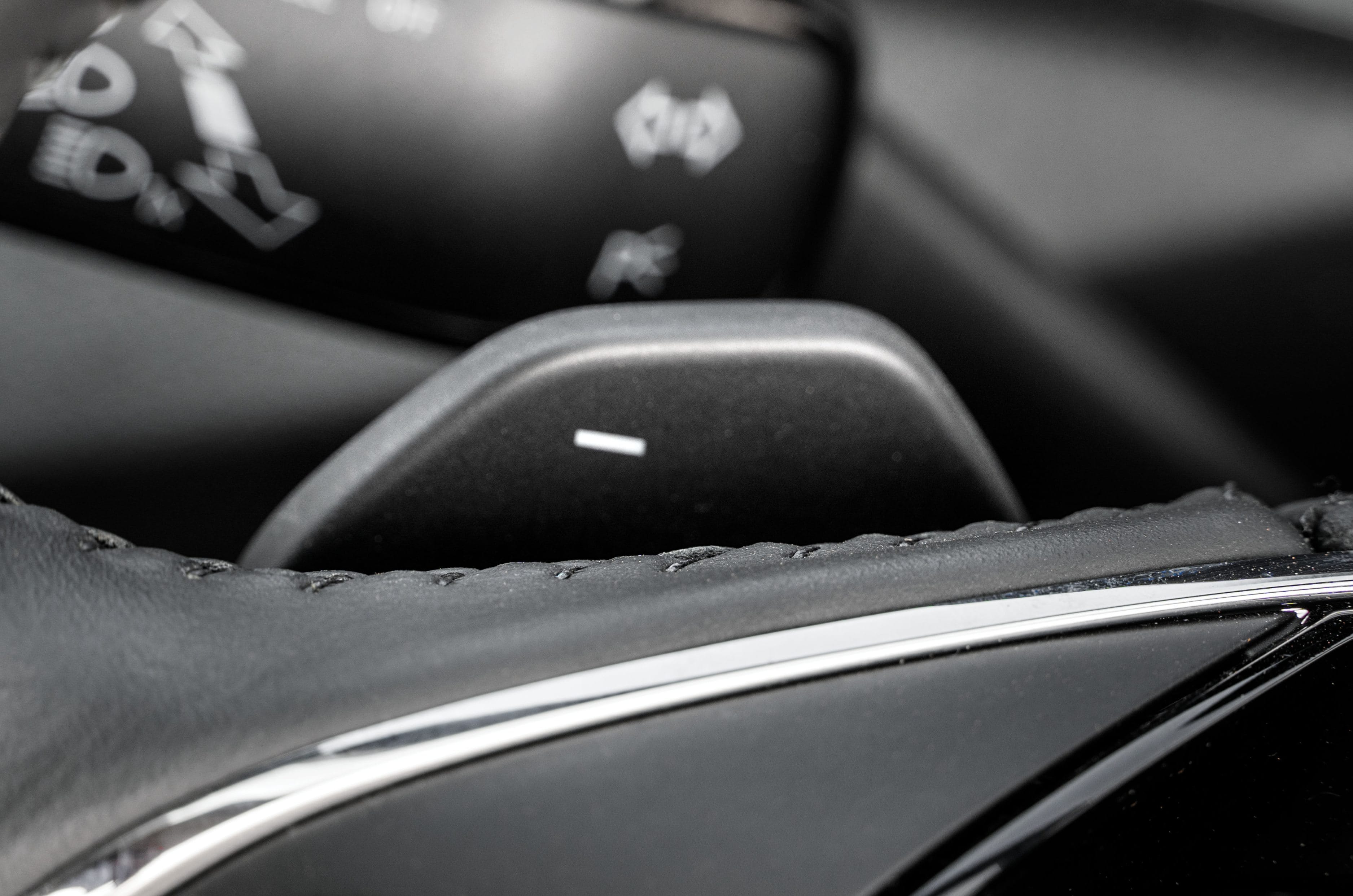 Paddle shifters feel nice to operate, but downshifts are a bit slow at times.