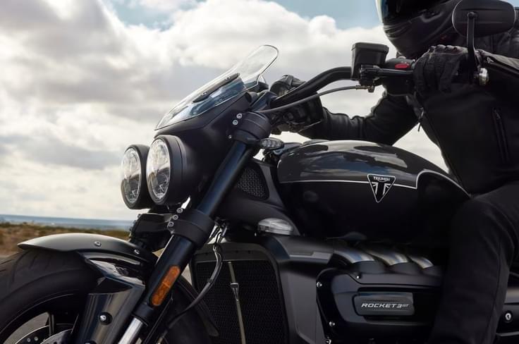 The Rocket 3 Storm duo is powered by the same liquid-cooled, 2,458cc, inline three-cylinder engine that now makes 182hp and 225Nm. Triumph Rocket 3 Storm left profile shot