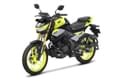 The Hornet 125 is priced at Rs 1.12 lakh (ex-showroom, Delhi). Honda CB125 Hornet neon yellow colour left side profile static in studio