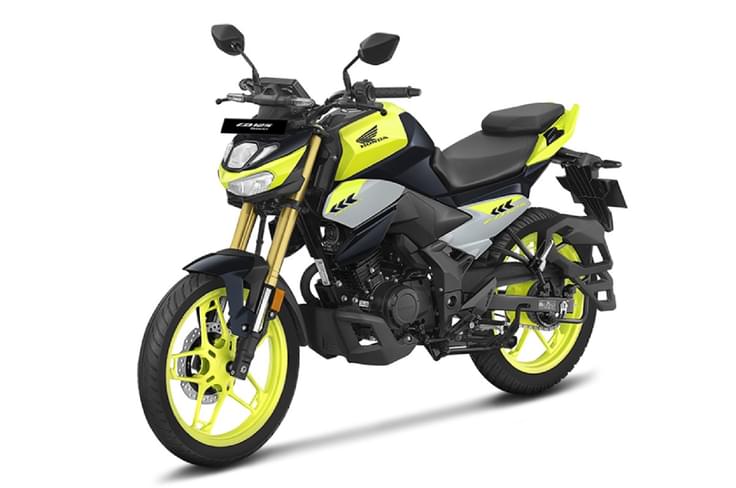 The Hornet 125 is priced at Rs 1.12 lakh (ex-showroom, Delhi). Honda CB125 Hornet neon yellow colour left side profile static in studio
