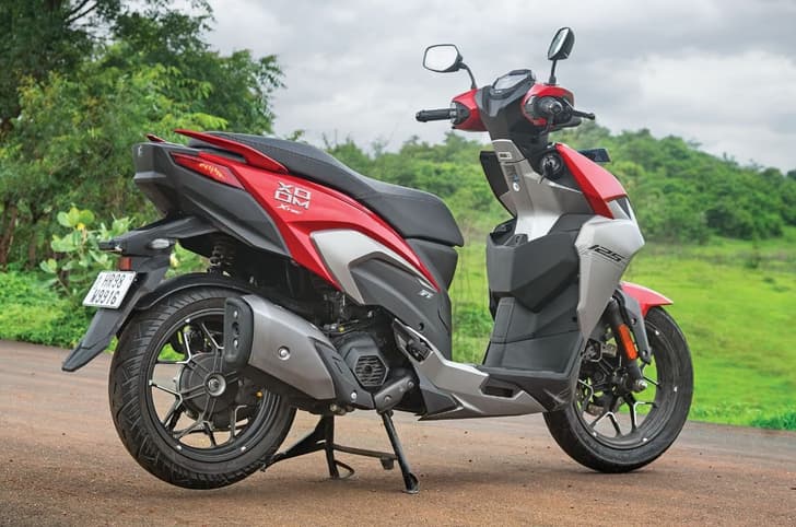 Hero Xoom 125 red rear right side static in field