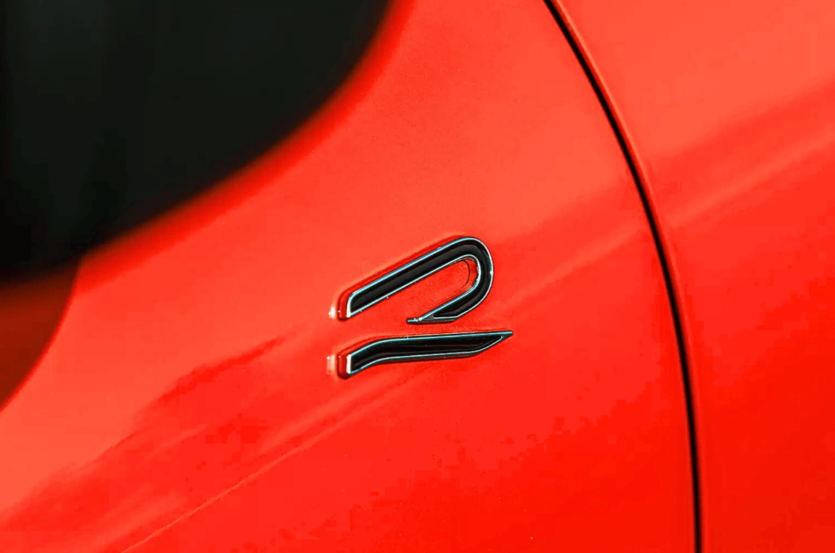 'R' badging is also present on the front door.