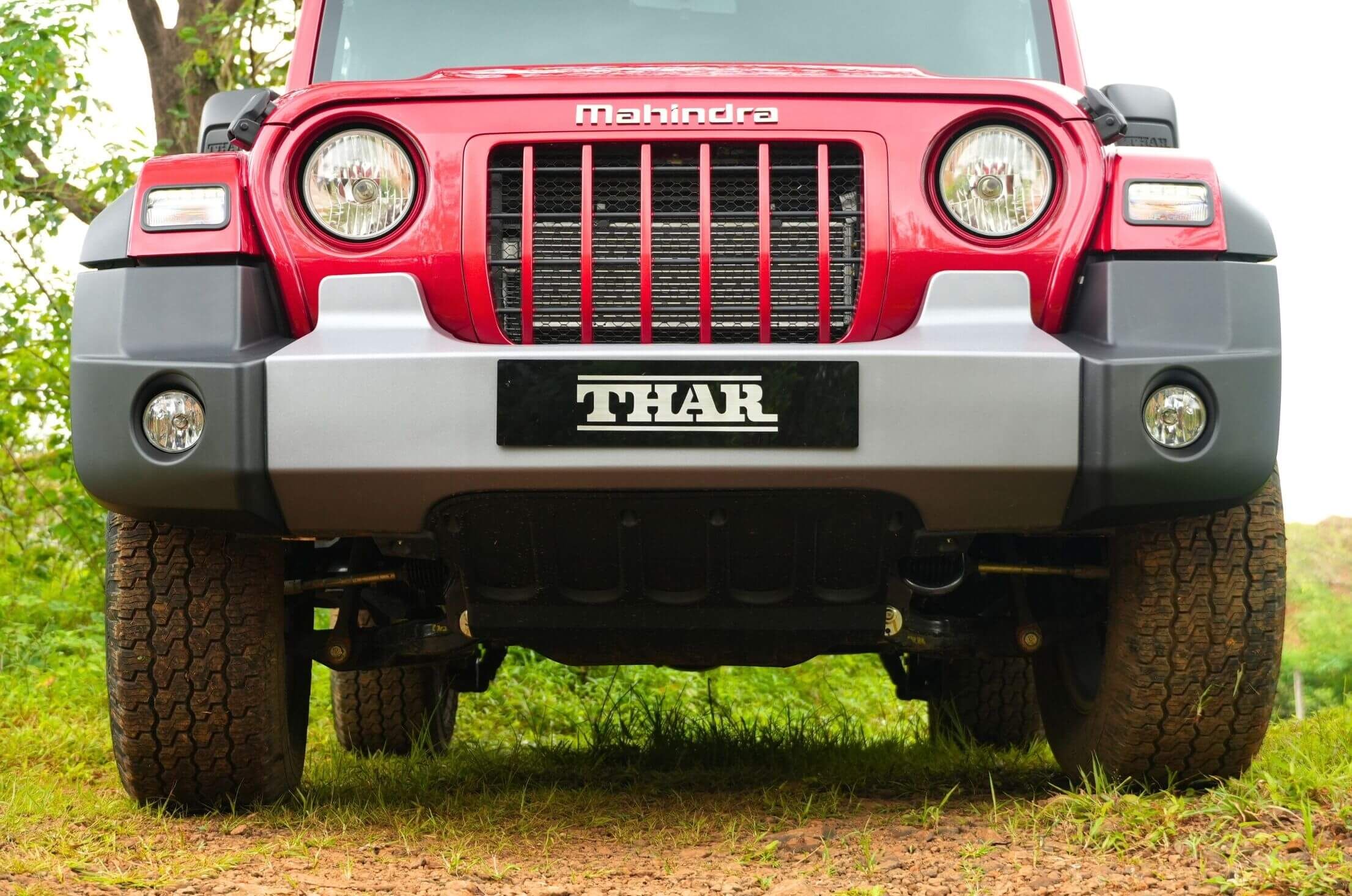 The front section features a body-coloured grille and a dual-tone bumper.