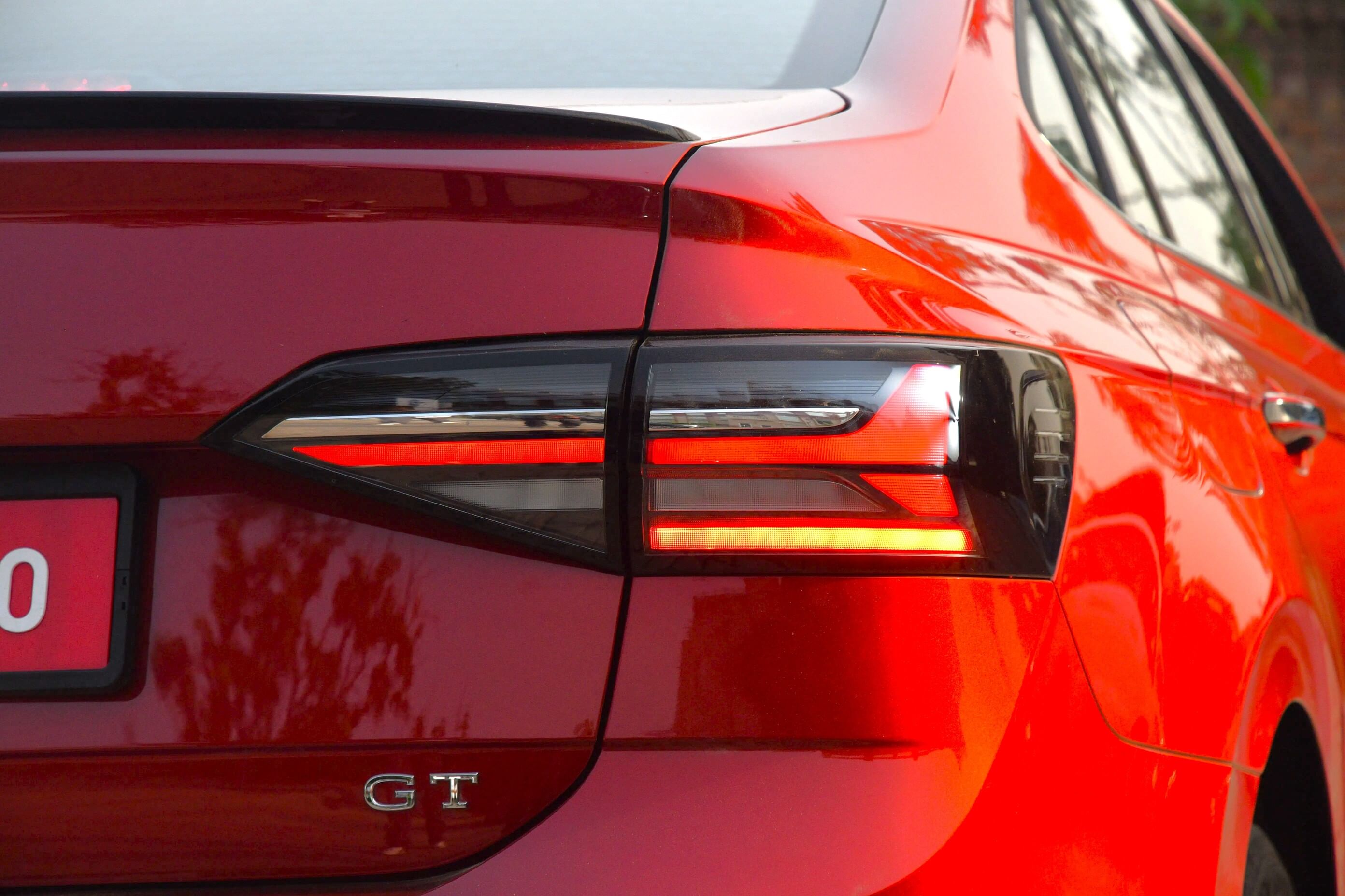 The Virtus gets smoked tail-lamps with Y-shaped DRLs and integrated indicators.