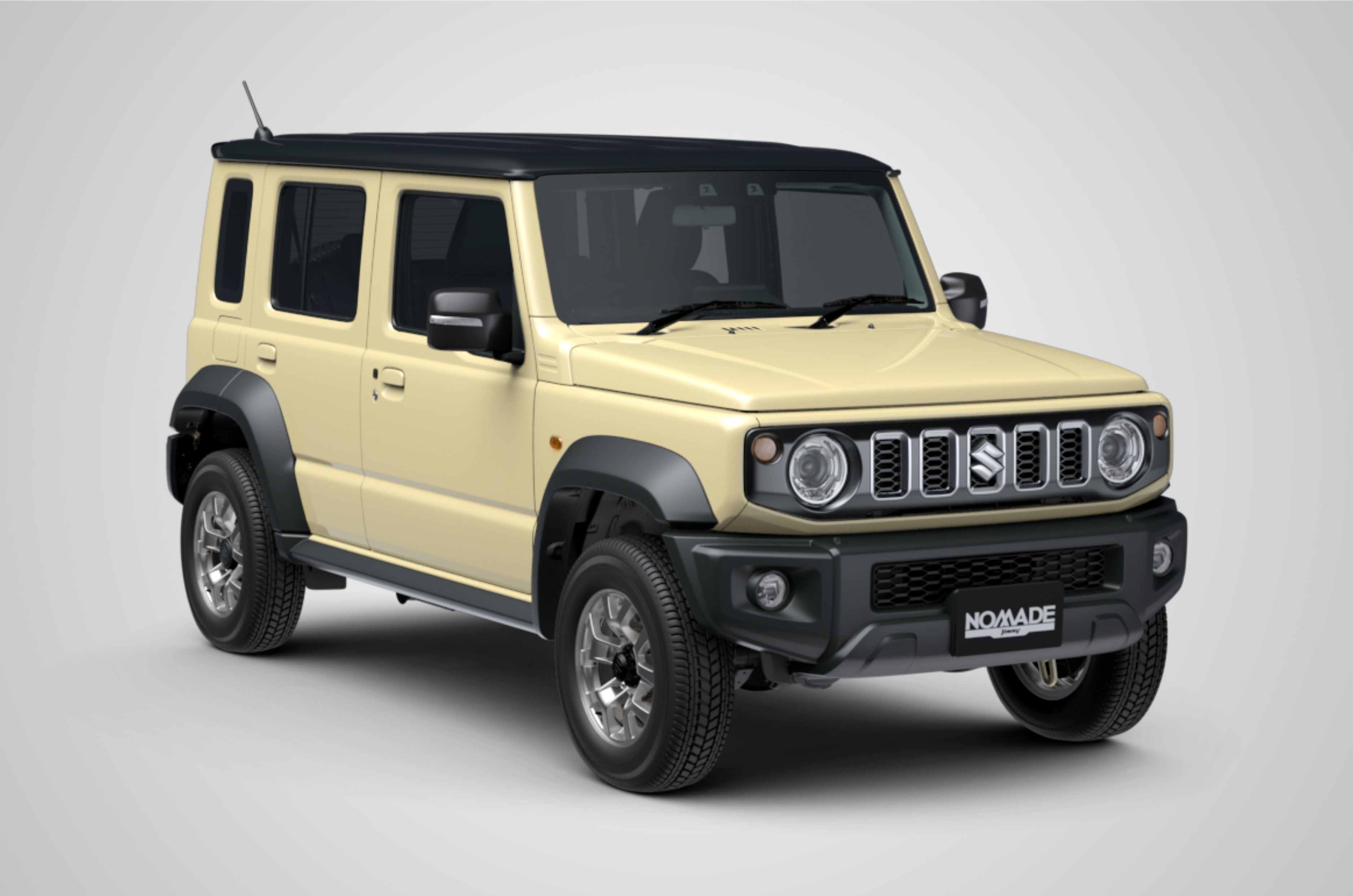 Suzuki Jimny in Chiffon Ivory Metallic shade with a black roof, sold in international markets.