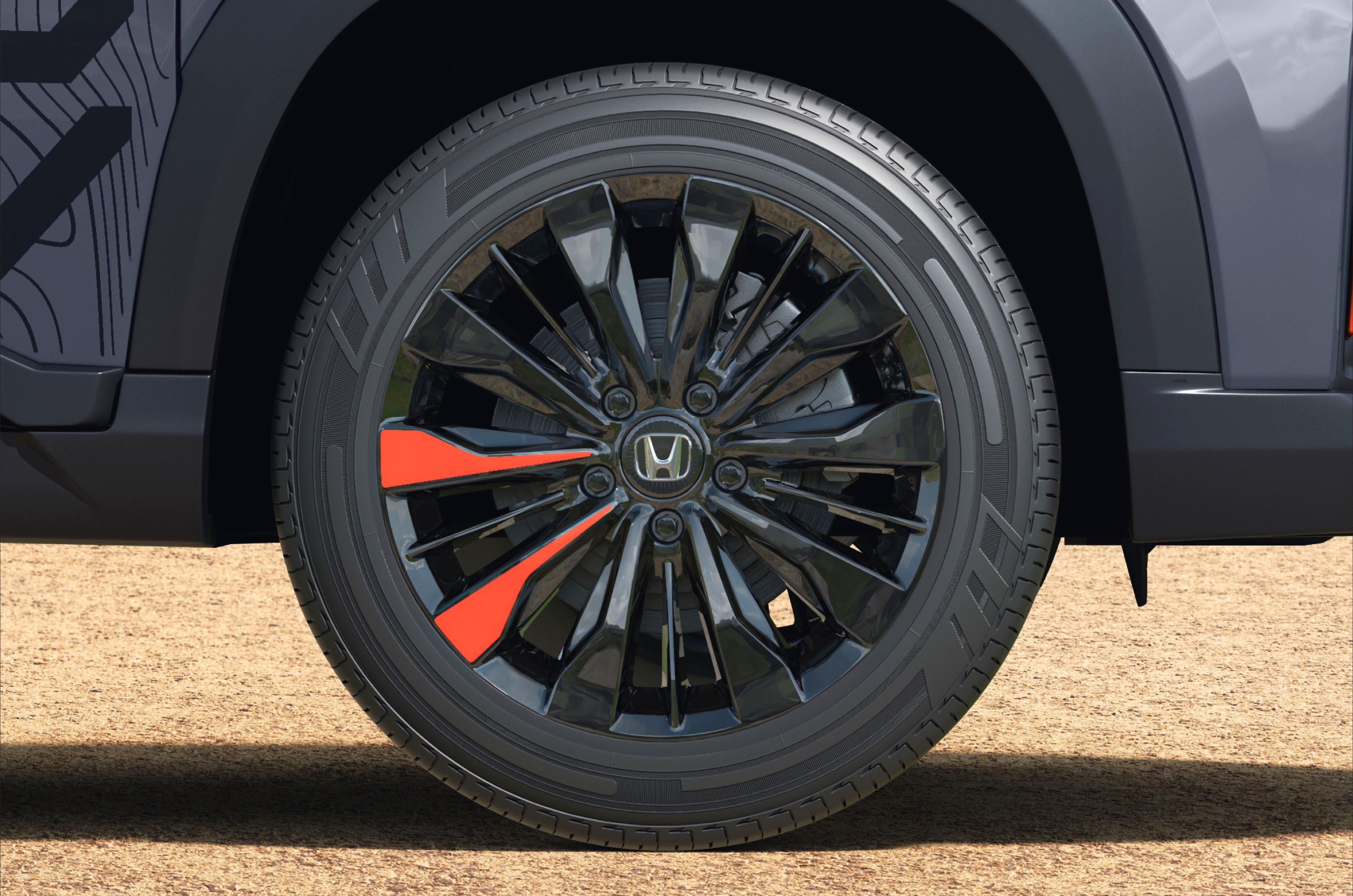 Comes with glossy black 17-inch alloy wheels with orange accents