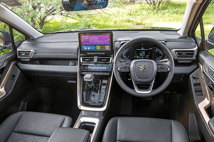 All the main controls, including the high-mounted gear lever, are easy to reach, and the dashboard layout is simple and practical. Maruti Invicto dashboard