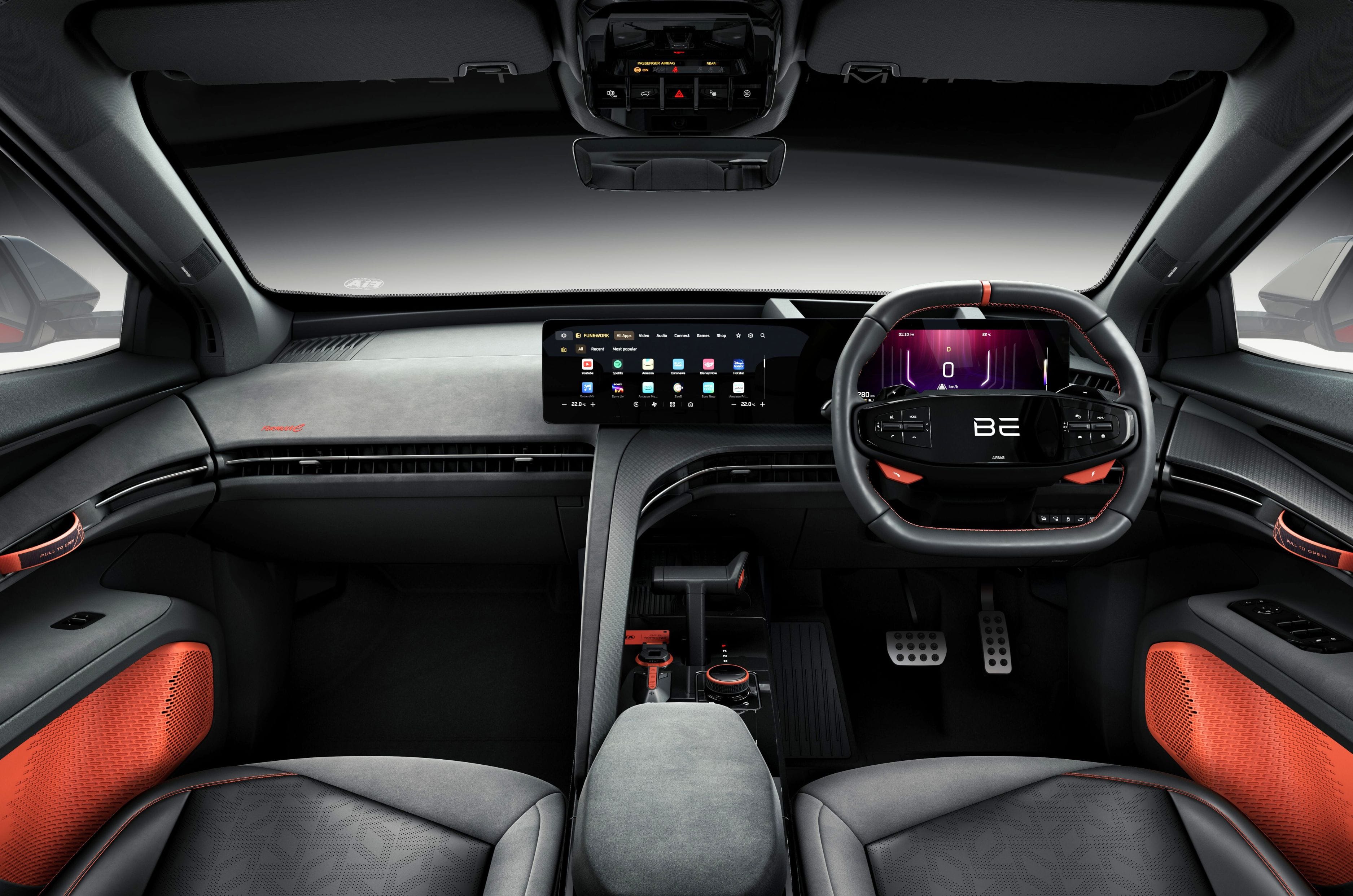 The twin-screen layout, fabric door handles and flat-bottom steering give the cabin a distinctly sporty feel.