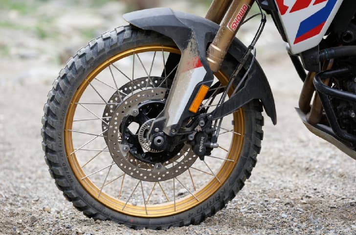 The bike rides on 21-inch front and 17-inch rear spoke wheels.