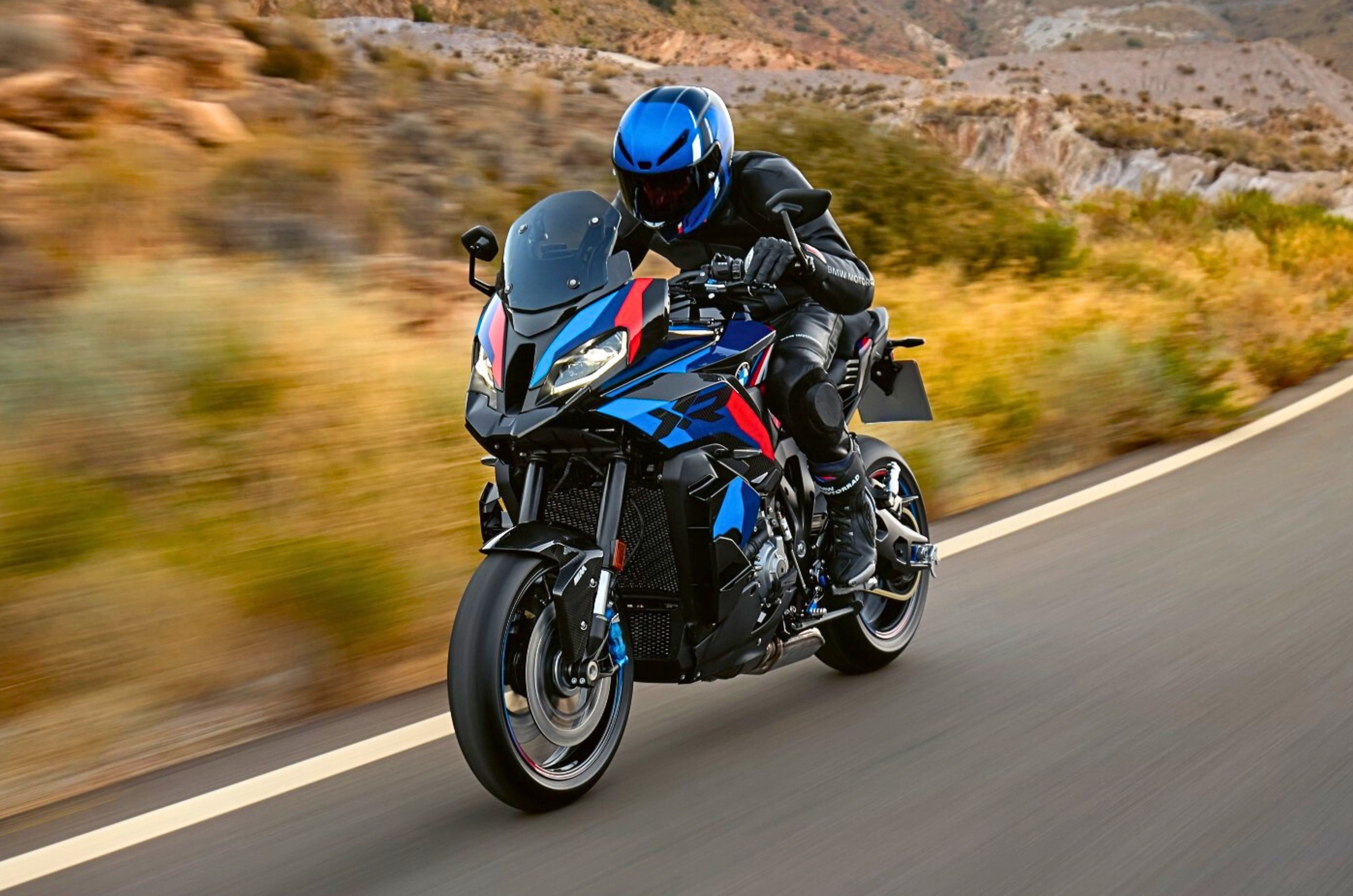 BMW M 1000 XR left front three quarter riding shot
