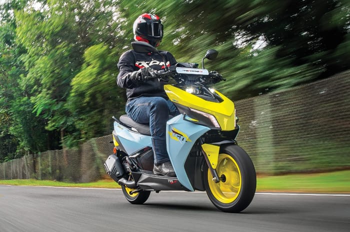 TVS Ntorq 150 front right side riding shot on track