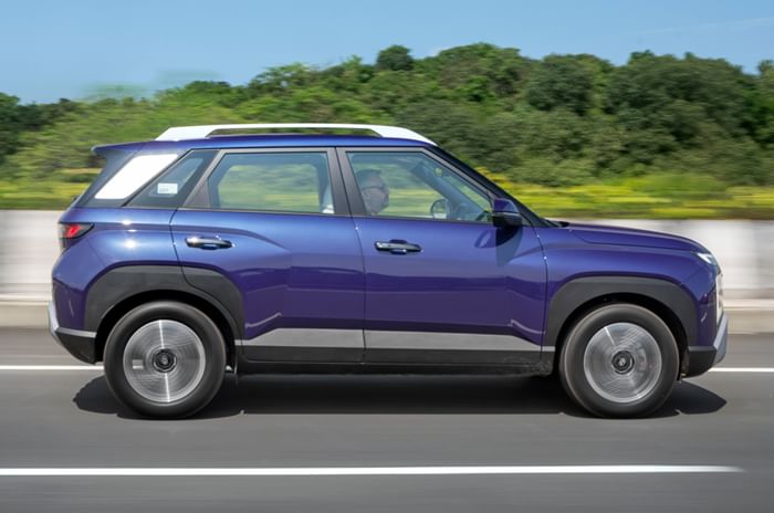 2025 Hyundai Venue side profile driving on road