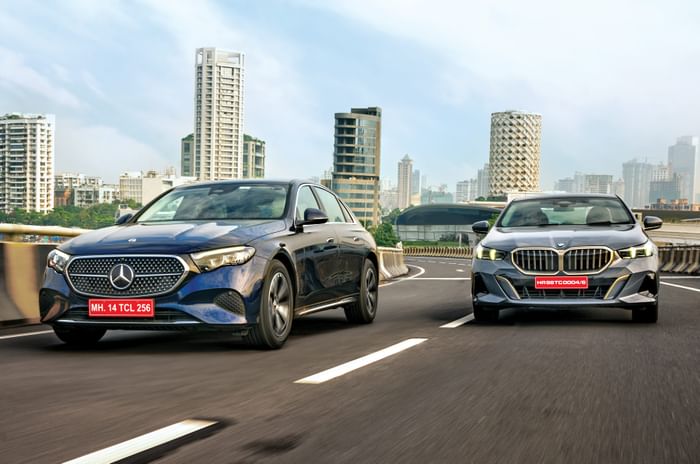 Mercedes E-Class vs BMW 5 Series front action Mercedes E-Class vs BMW 5 Series front action