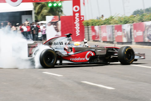 Hamilton drives MP4-23 in Bangalore